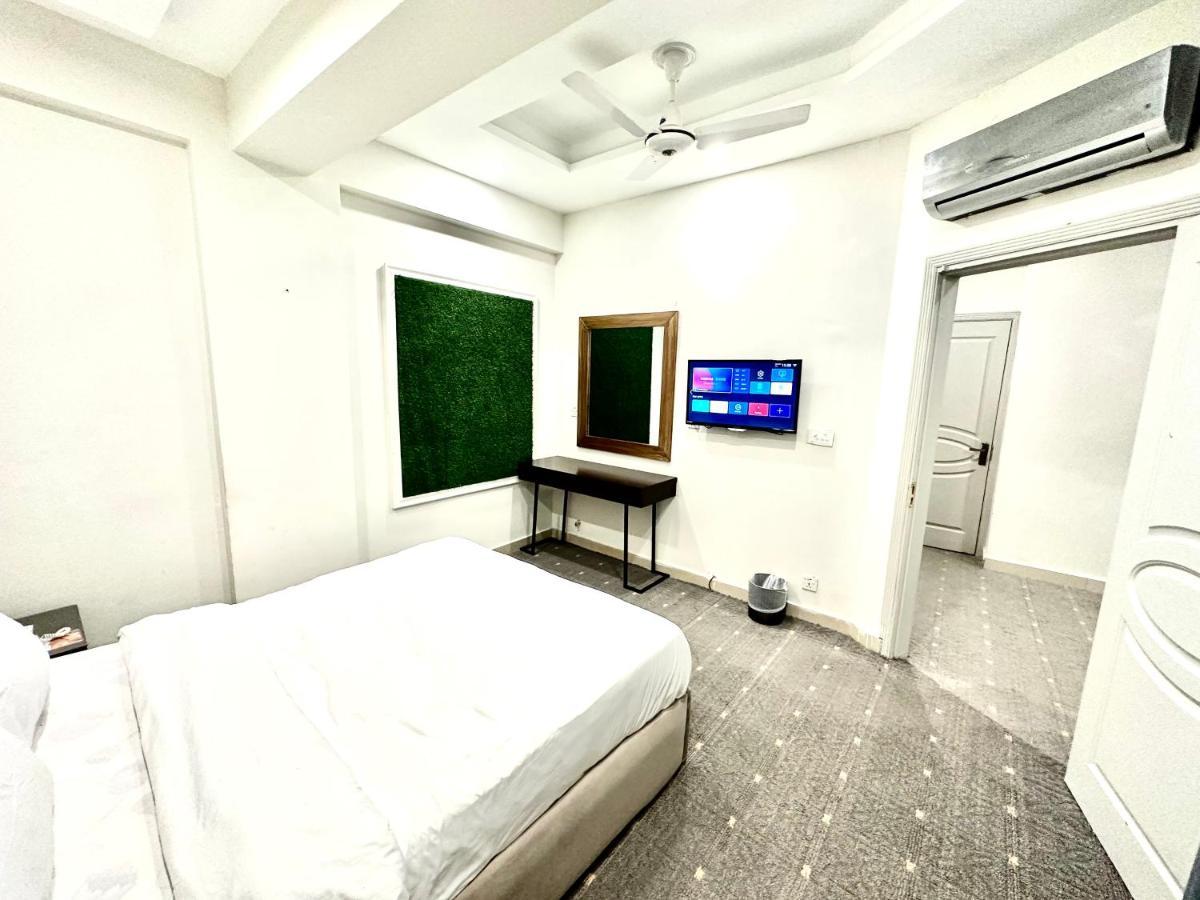 Mudan Hotel And Suite Islamabad Rum bild