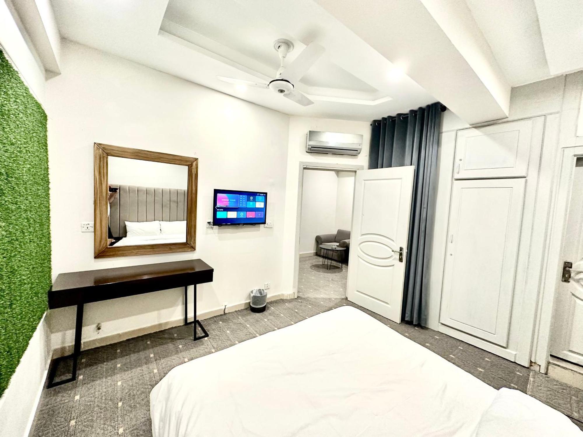 Mudan Hotel And Suite Islamabad Rum bild