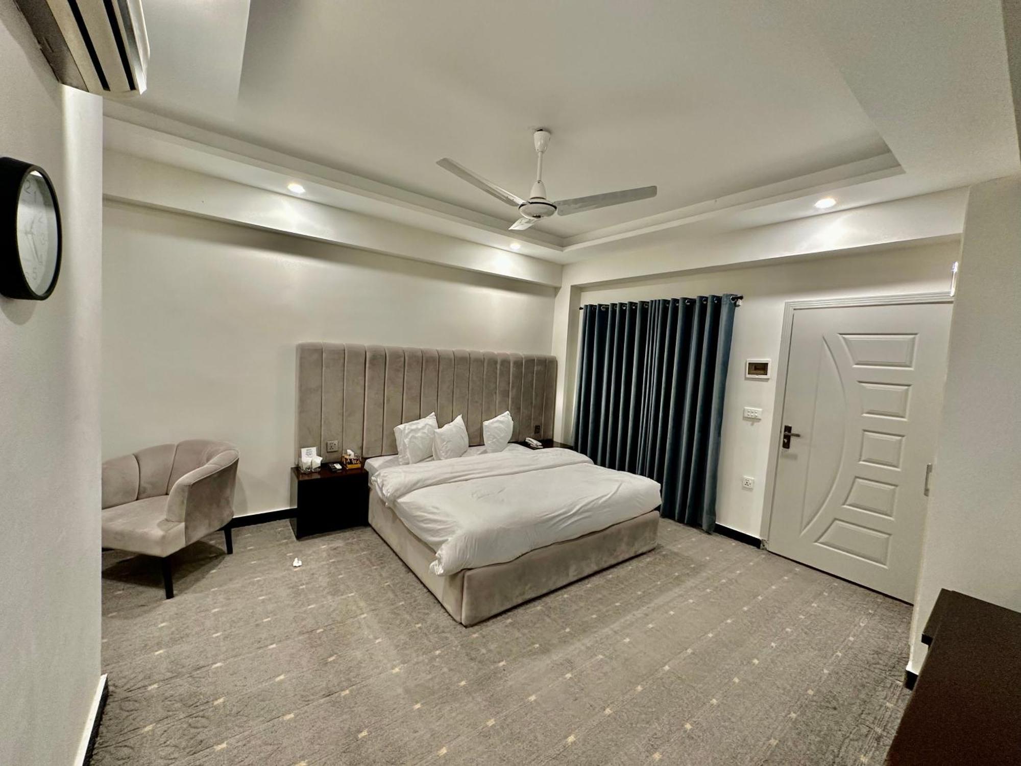 Mudan Hotel And Suite Islamabad Rum bild