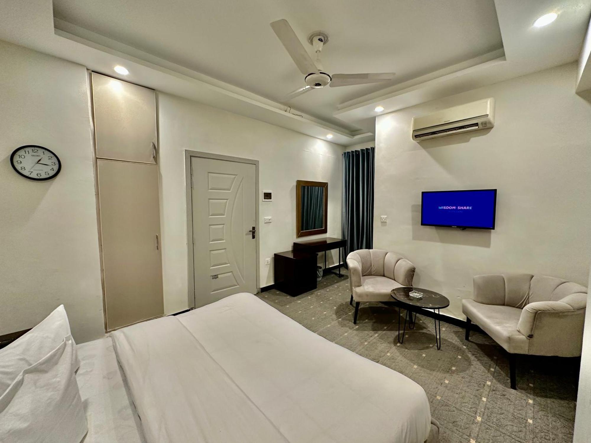 Mudan Hotel And Suite Islamabad Rum bild